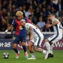 Barcelona's Lamine Yamal fights for the ball with Inter Mila duo Federico Dimarco and Hakan Calhanoglu during last week's Champions League semi-final first leg at Estadi Olimpic Lluis Companys in Montjuic. (Photo by JOSEP LAGO/AFP via Getty Images)          