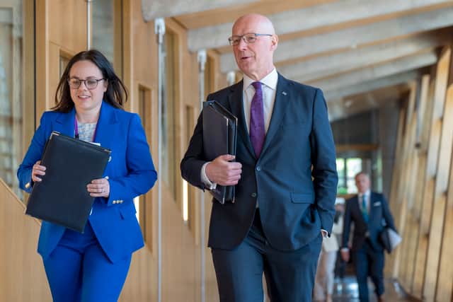 First Minister of Scotland John Swinney and Deputy First Minister Kate Forbes (left) arrive at the main chamber to deliver a statement on his Programme for Government to the Scottish Parliament at Holyrood, Edinburgh, setting out his priorities for the coming year and the legislation the Scottish Government will bring forward. Picture date: Tuesday May 6, 2025. PA Photo. See PA story POLITICS Scotland. Photo credit should read: Jane Barlow/PA Wire