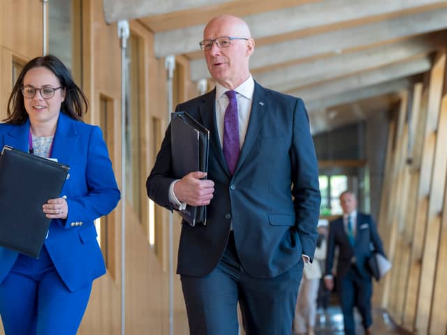 First Minister of Scotland John Swinney and Deputy First Minister Kate Forbes (left) arrive at the main chamber to deliver a statement on his Programme for Government to the Scottish Parliament at Holyrood. Photo: Jane Barlow/PA Wire
