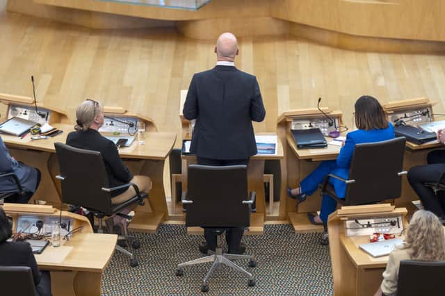 John Swinney delivers a statement about his Programme for Government to MSPs (Picture: Jane Barlow)