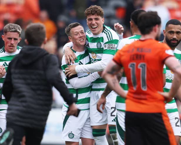 Celtic's Callum McGregor and Arne Engels celebrate their Scottish Premiership title win at Dundee United. Cr: SNS Group.