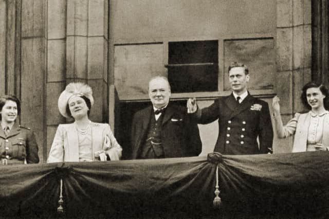 Winston Churchill, centre, with, from left, the then Princess Elizabeth, Queen Elizabeth, King George VI, and Princess Margaret on the balcony of Buckingham Palace on VE Day in 1945 (Picture: Culture Club)