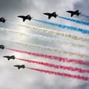 Royal Air Force (RAF) aircraft the Red Arrows complete a flypast. Picture: Matt Cardy/Getty Images
