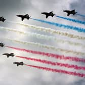 Royal Air Force (RAF) aircraft the Red Arrows complete a flypast. Picture: Matt Cardy/Getty Images