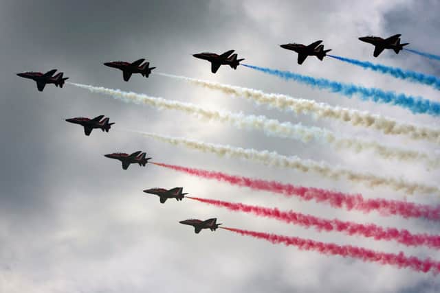 Royal Air Force (RAF) aircraft the Red Arrows complete a flypast. Picture: Matt Cardy/Getty Images