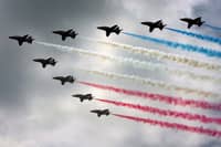 Royal Air Force (RAF) aircraft the Red Arrows complete a flypast. Picture: Matt Cardy/Getty Images