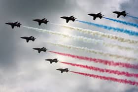 Royal Air Force (RAF) aircraft the Red Arrows complete a flypast. Picture: Matt Cardy/Getty Images
