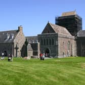 Iona Abbey, Argyll and Bute, Scotland. In 563, St Columba arrived from Ireland and established a monastery on the island, embarking on his mission to convert pagan Scotland and northern England to Christianity. The monastery was abandoned after frequent Viking raids, but a Benedictine Abbey was established in the 1200s. The Protestant Reformation in Scotland saw the abbey closed in the 16th century, but the Church of Scotland began to rebuild it in the 1870s and the Iona Community was established in 1938.