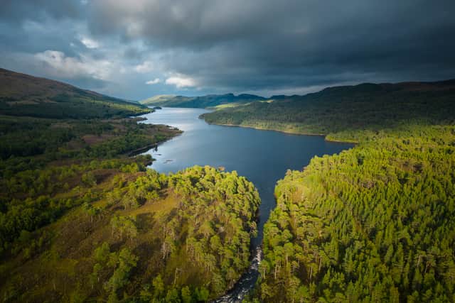 The river Affric running into Loch Beinn a Mheadhoin in Glen Affric, Affric Highlands.
