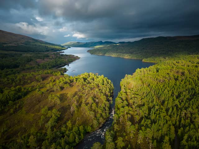 The river Affric running into Loch Beinn a Mheadhoin in Glen Affric, Affric Highlands.