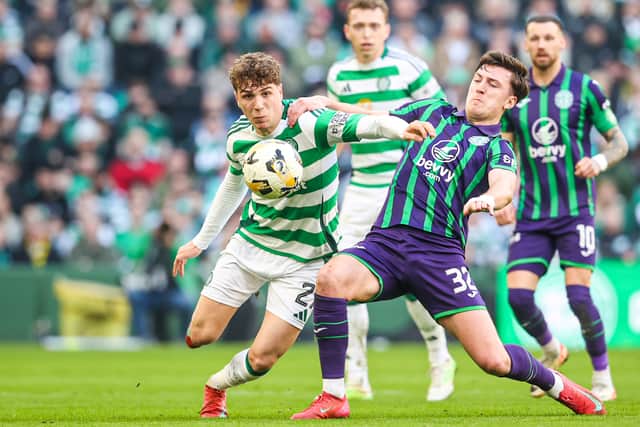Celtic's Arne Engels and Hibernian's Josh Campbell in action during a Scottish Gas Scottish Cup Quarter-Final match between Celtic and Hibs. Cr: SNS Group.