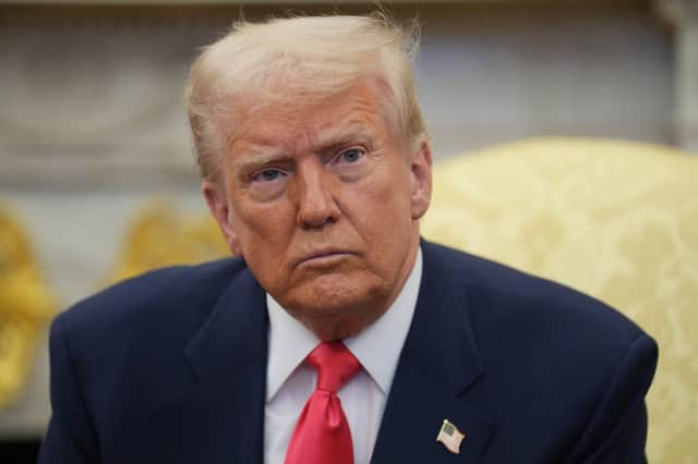 Donald Trump announced the deal on Thursday. Picture: Niall Carson/PA Wire 