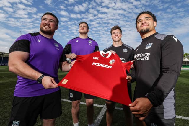 Glasgow Warriors' Zander Fagerson, Scott Cummings, Huw Jones and Sione Tuipulotu at Scotstoun after being called up for the British and Irish Lions squad.