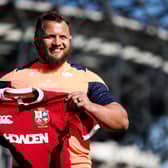Pierre Schoeman shows off the Lions shirt with pride.