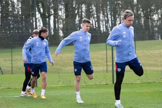 Barrie McKay, right, trains for Hearts.