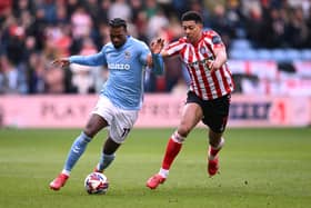Haji Wright of Coventry City holds off the challenge of Jobe Bellingham of Sunderland during the Sky Bet Championship match at The CBS Arena. Cr: Getty Images.
