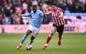 Haji Wright of Coventry City holds off the challenge of Jobe Bellingham of Sunderland during the Sky Bet Championship match at The CBS Arena. Cr: Getty Images.