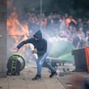 Rioters attack a Holiday Inn Express Hotel where asylum seekers were staying In Rotherham in August last year (Picture: Christopher Furlong)