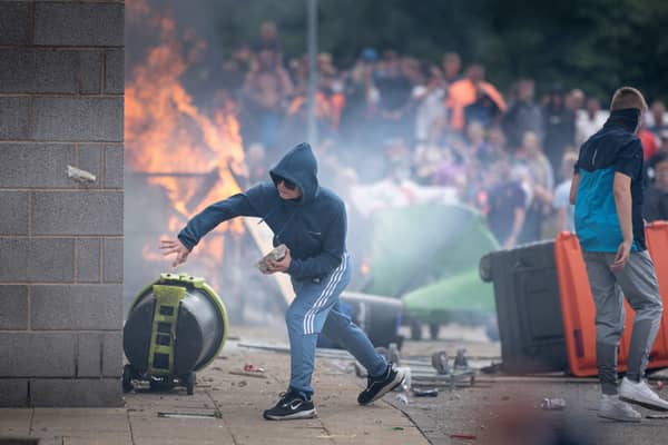 Rioters attack a Holiday Inn Express Hotel where asylum seekers were staying In Rotherham in August last year (Picture: Christopher Furlong)