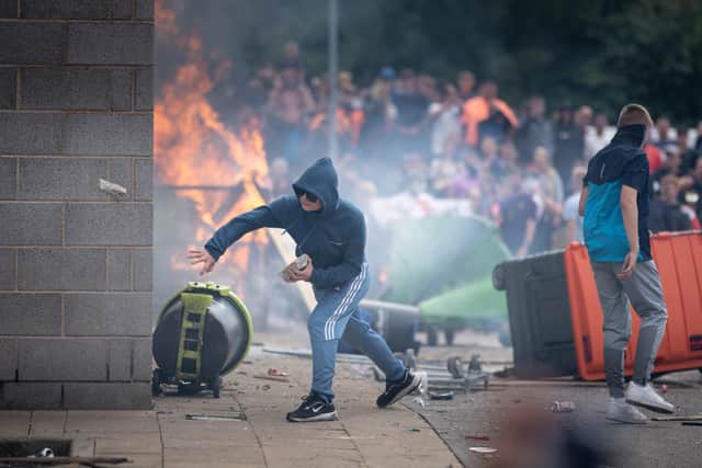 Rioters attack a Holiday Inn Express Hotel where asylum seekers were staying In Rotherham in August last year (Picture: Christopher Furlong)