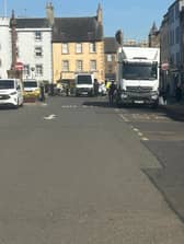 A man has appeared in court accused of attempted murder following a crash involving a police officer in Haddington. 