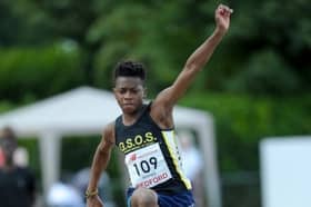 Miraji Ahmed competing in the triple jump as a junior
