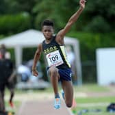 Miraji Ahmed competing in the triple jump as a junior