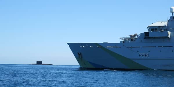 A “secret weapon” is being developed and could be used by Royal Navy technicians to search for Russian submarines. Pictured: HMS Tyne with Russian Kilo-class submarine Krasnodar in the background.