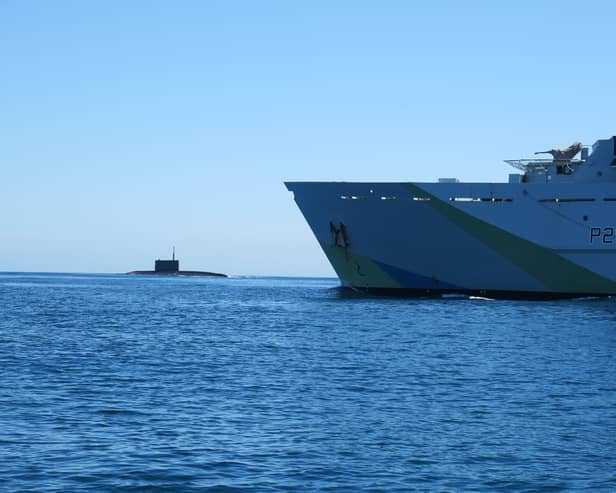 A “secret weapon” is being developed and could be used by Royal Navy technicians to search for Russian submarines. Pictured: HMS Tyne with Russian Kilo-class submarine Krasnodar in the background.
