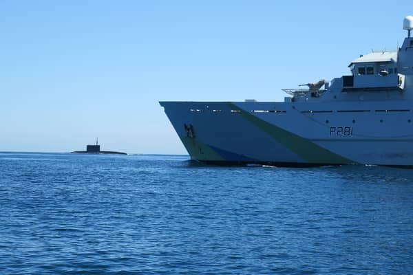 A “secret weapon” is being developed and could be used by Royal Navy technicians to search for Russian submarines. Pictured: HMS Tyne with Russian Kilo-class submarine Krasnodar in the background.