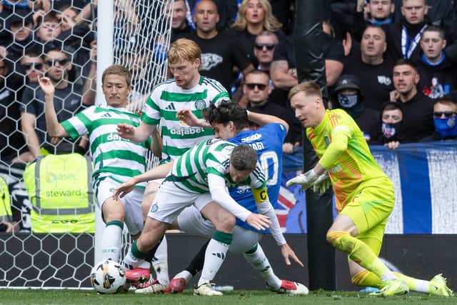 Celtic's Callum McGregor challenges Rangers' Ianis Hagi in the box in the 80th minute of Sunday's Old Firm clash at Ibrox.  (Photo by Craig Foy / SNS Group)