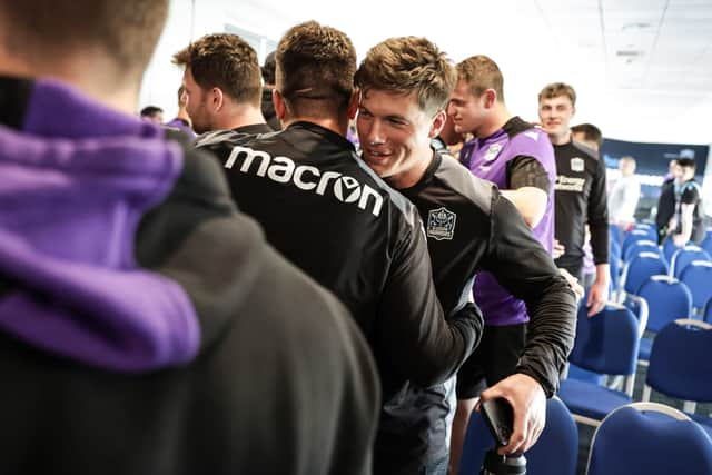 Hugs for Glasgow Warriors' Huw Jones after he is named in the British & Irish Lions squad.