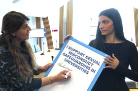 Pam Gosal MSP, left, signs a petition raised by rape survivor and campaigner Ellie Wilson calling for national safeguarding guidance in universities (Picture: Neil Pooran)