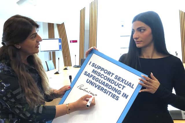 Pam Gosal MSP, left, signs a petition raised by rape survivor and campaigner Ellie Wilson calling for national safeguarding guidance in universities (Picture: Neil Pooran)