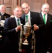 Sir Tom Farmer, left, and then Hibs captain David Gray after the Scottish Cup triumph in 2016.