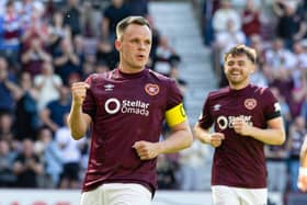 Lawrence Shankland scored twice for Hearts against Motherwell.