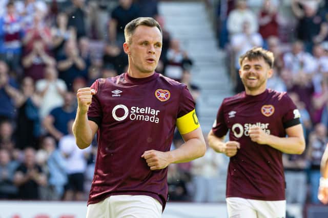 Lawrence Shankland scored twice for Hearts against Motherwell.