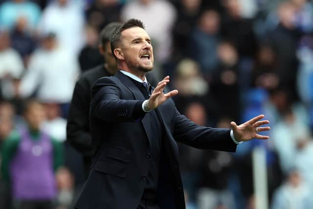 Rangers interim manager Barry Ferguson passes on instructions to his players