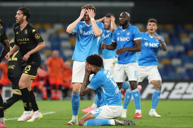 Scott McTominay and his Napoli teammates react to a missed chance in the 2-2 draw with Genoa. (Photo by CARLO HERMANN/AFP via Getty Images)