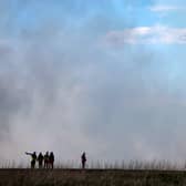 A helicopter tackles a wildfire near a wooded area in West Lothian in Fauldhouse. Picture: Jeff J Mitchell/Getty Images