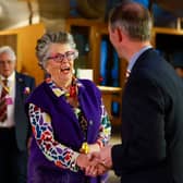 Restaurateur, broadcaster and cookery writer Prue Leith shakes hands with Liam McArthur MSP as she lends her support to his bill to legalise assisted dying in Scotland (Picture: Jeff J Mitchell)