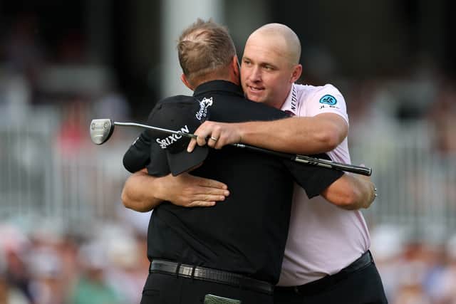 Sepp Straka is embraced by Shane Lowry at the end of their final-round battle in the Truist Championship 