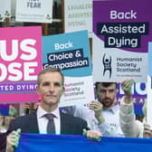 Liberal Democrat MSP Liam McArthur speaks tio suppoters ahead of the vote on assisted dying at Holyrood