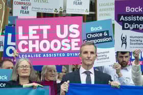 Liberal Democrat MSP Liam McArthur speaks tio suppoters ahead of the vote on assisted dying at Holyrood