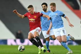 Scott McTominay is hunted down by Kevin de Bruyne during their time as opponents in Manchester.