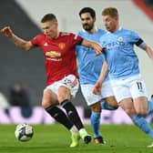 Scott McTominay is hunted down by Kevin de Bruyne during their time as opponents in Manchester.