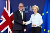 Keir Starmer, seen shaking hands with European Commission president Ursula von der Leyen, is seeking to remove barriers to trade with the European Union but there will be no return to the customs union (Picture: Benjamin Cremel/pool)