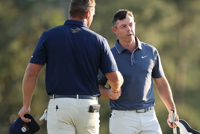 Rory McIlroy shakes hands with Bryson DeChambeau at the end of their conversation-free final round in last month’s Masters at Augusta National Golf Club