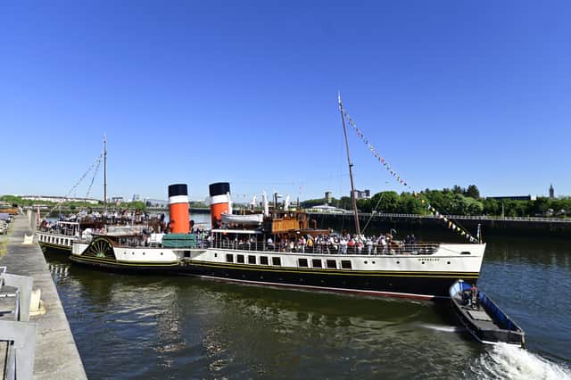 Waverley leaving dock beside Glasgow Science Centre on May 16