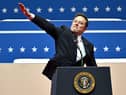 Elon Musk makes a gesture compared by some to a Nazi salute while speaking at the Capitol One Arena in Washington on the day of Donald Trump's inauguration as US President (Picture: Angeal Weiss)